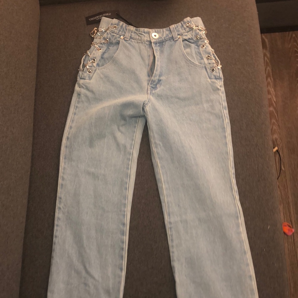Straight leg jeans with chain detail